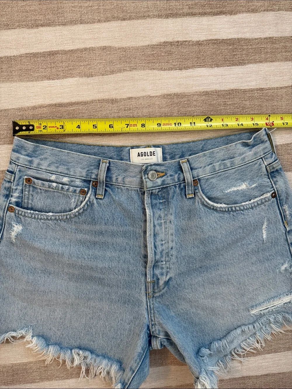 AGOLDE Medium Wash Frayed Hem Denim Cutoff Shorts